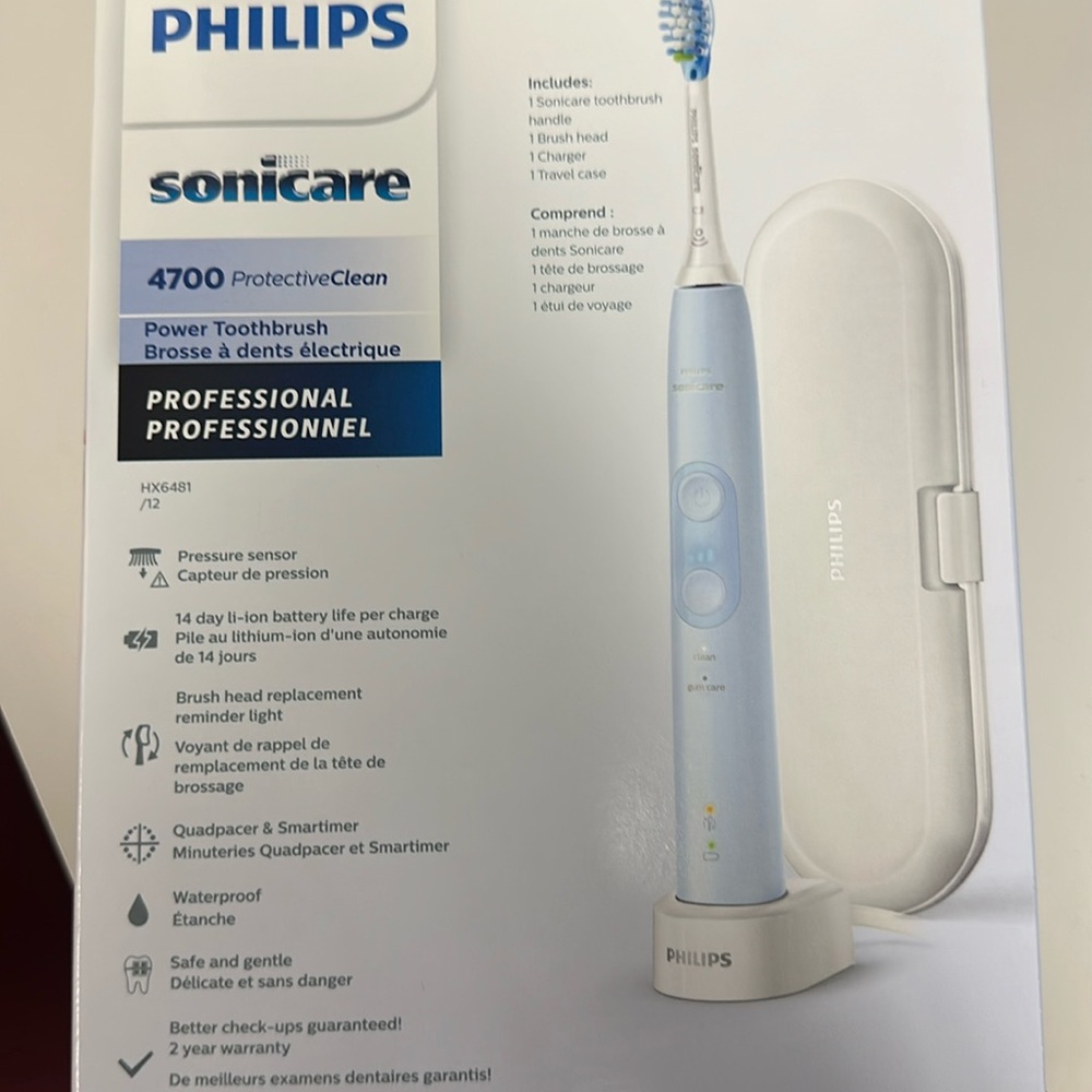 Brand new Adult Phillips Sonicare electric toothbrush in blue